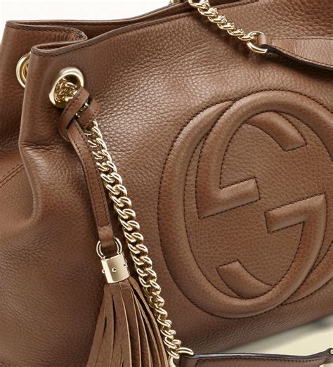 tas gucci gold tote|Gucci shoulder bag brown.